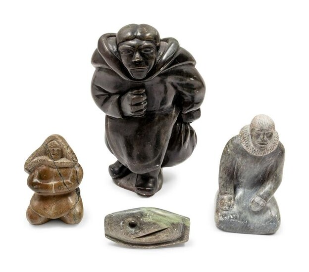 A Group of Inuit Soapstone Carvings largest figure