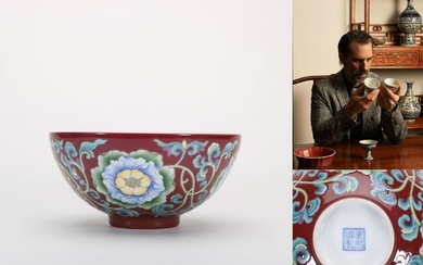 A Kangxi-period famille-rose enameled floral bowl