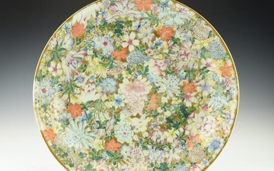 A LARGE CHINESE FAMILLE ROSE MILLEFLEURS PLATE