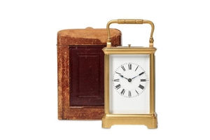 A LATE 19TH CENTURY FRENCH GILT BRASS CARRIAGE CLOCK