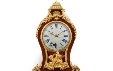 A Louis XV gilt bronze- mounted Kingwood Cartel Clock and Bracket, Circa 1725
