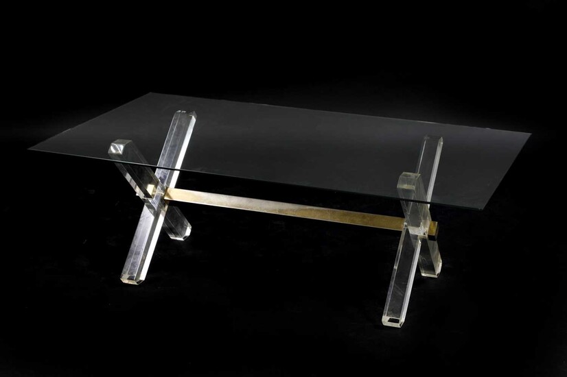 A Lucite and glass coffee table