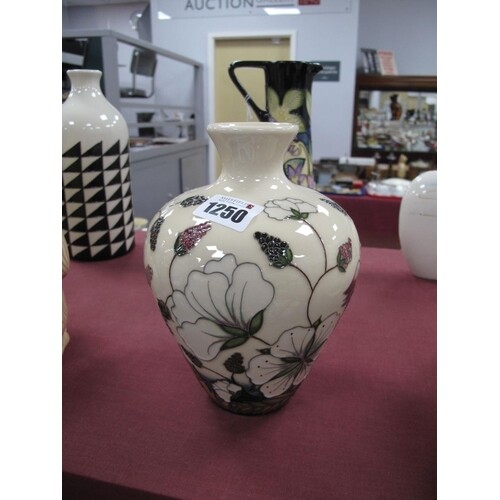 A Moorcroft Pottery Vase, painted in the 'Bramble Revisited'...