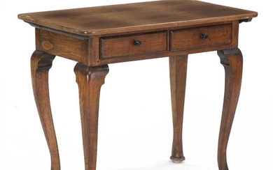SOLD. A North German English inspired walnut and beechwood table with pad-feet. Last half of...