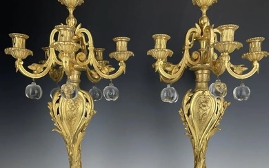 A PAIR OF DORE BRONZE & BACCARAT CRYSTAL CANDELABRA