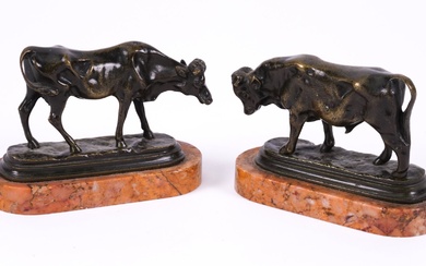 A PAIR OF FRENCH BRONZE FIGURES OF A BULL AND COW (2)