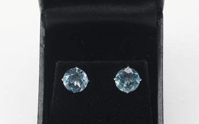 A PAIR OF TOPAZ SET EARRINGS, THE ROUND CUT BLUE TOPAZ TOTALLING 6.29CTS, TO POST AND BUTTERFLY FITTINGS, IN 14CT WHITE GOLD, DIAMET...