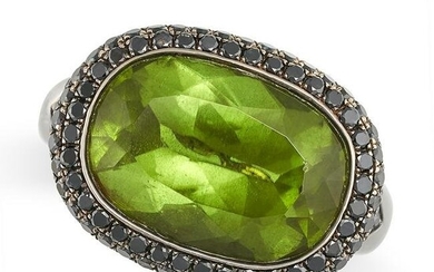 A PERIDOT AND BLACK DIAMOND COCKTAIL RING in 18ct blacked gold, set with an oval cut peridot of
