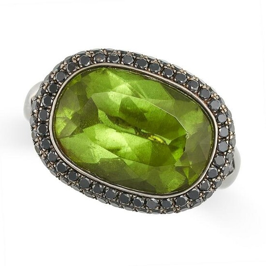 A PERIDOT AND BLACK DIAMOND COCKTAIL RING in 18ct blacked gold, set with an oval cut peridot of