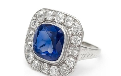 A Platinum, White Gold, Synthetic Sapphire and Diamond