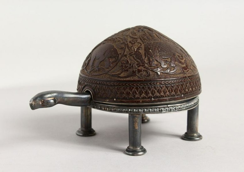 A RARE SILVER AND COCONUT SHELL CLOCK, formed as a