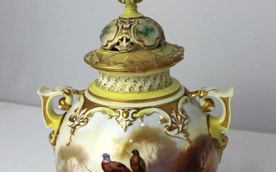 A Royal Worcester Hadley ware porcelain vase and cover painted by William Powell