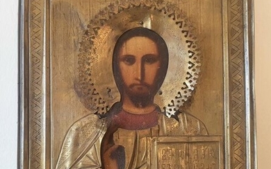 A Russian painted icon in gilt metal frame, a...