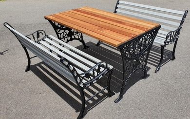 A THREE PIECE SLATTED TIMBER AND CAST IRON OUTDOOR SETTING