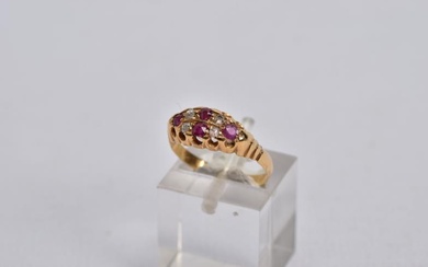 A VICTORIAN DIAMOND AND RUBY BOAT RING, set with...