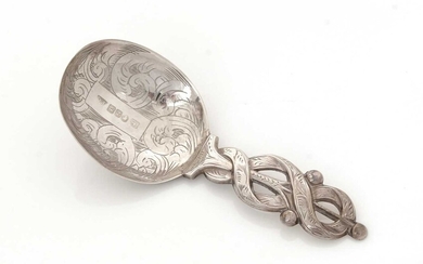 A Victorian silver engraved caddy spoon.