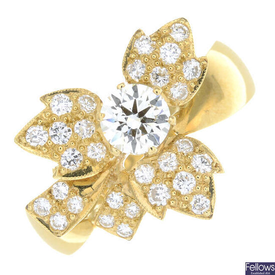 A brilliant-cut diamond foliate dress ring.