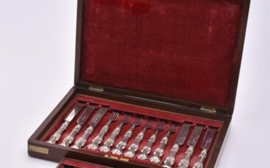 A cased Victorian silver matched set of twelve Albert pattern dessert knives and forks