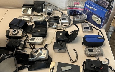 A collection of compac cameras including Sony, Olympus, Fuji...