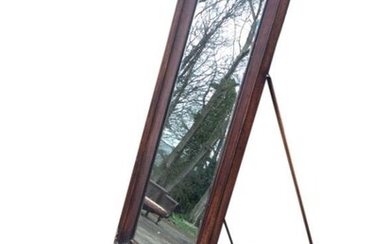 A contemporary cheval mirror, the rectangular plate in concave...