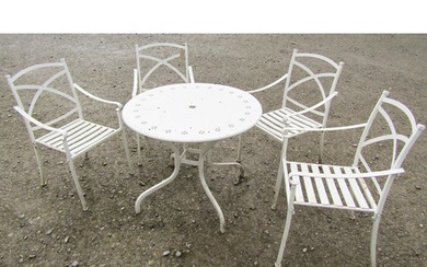 A cream painted cast alloy garden terrace table the circular...