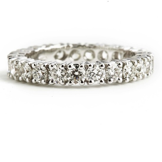 A diamond eternity ring set with numerous brilliant-cut diamonds weighing a total of app. 2.33 ct., mounted in 18k white gold. G/SI1. Excellent-cut.