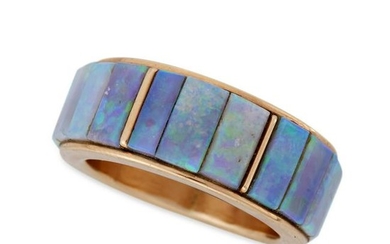 A fourteen karat gold and opal ring