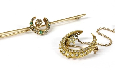 A gold diamond and emerald crescent bar brooch