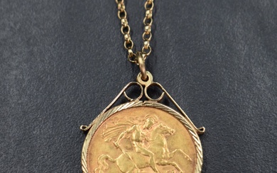 A gold half sovereign dated 1909 in a 9ct gold removable decorative pendant mount on a 9ct gold