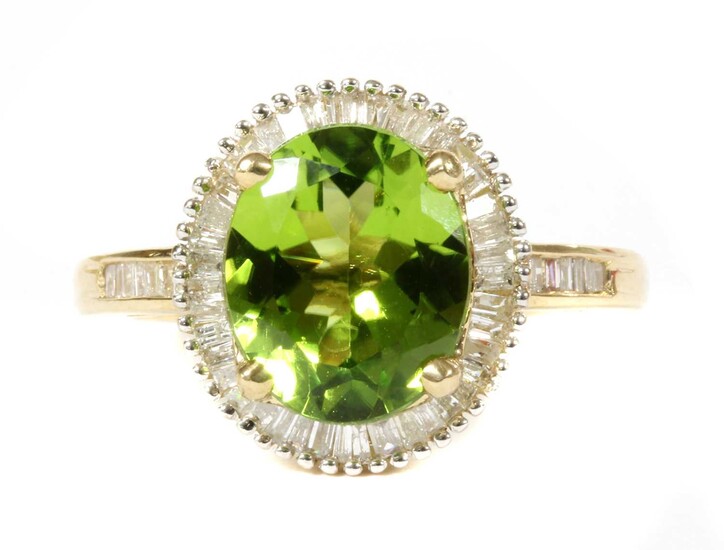 A gold peridot and diamond cluster ring