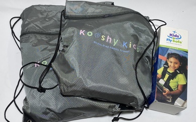 A group of kids travel accessories including Two marked Kooshy Kids