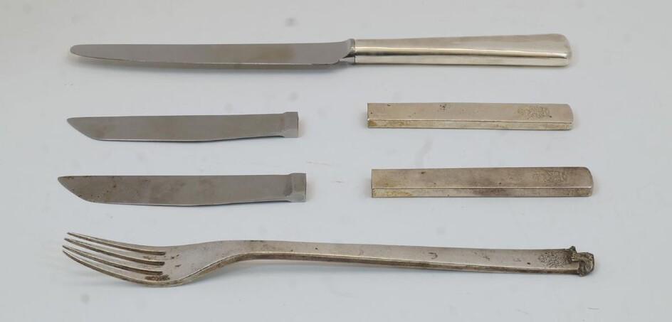 A group of modern silver cutlery, by Gerald Benney, comprising: a fork, London, 1966; a silver handled knife, London, 1998, damaged; and two silver handled knives with detached steel handles, London 1988, weighable silver approx. 2.5oz (4)