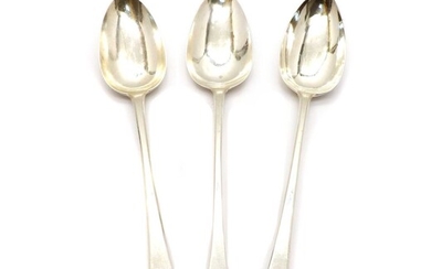 A group of three silver basting spoons