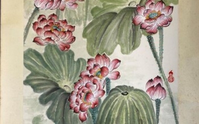 A ink on rice paper painting of lotus with...