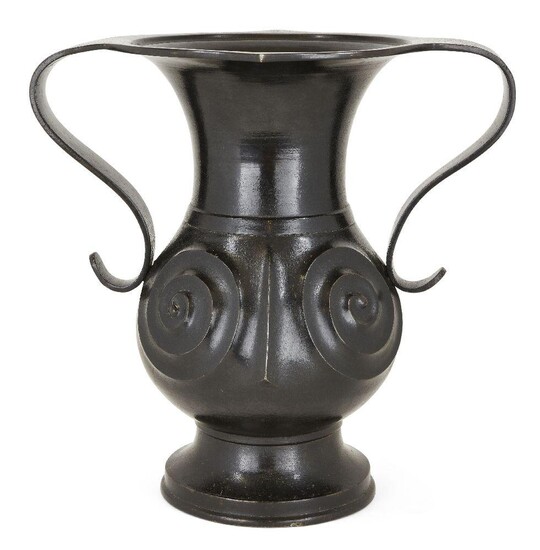 A large Japanese bronze Han style twin handled vase, 19th century, each side cast with spirals issuing from the base of the strap handles, 40cm high