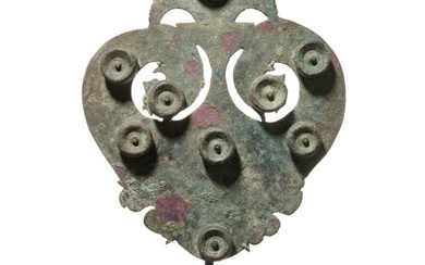 A large Roman bronze fitting on a stand, 2nd - 3rd century