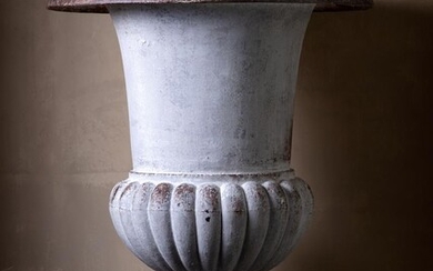 A large cast iron garden urn