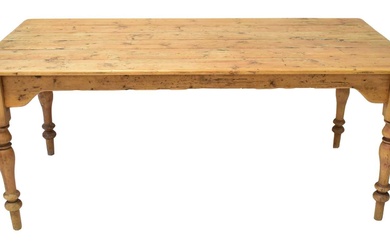 A large rustic pine farmhouse table of plank top construction,...