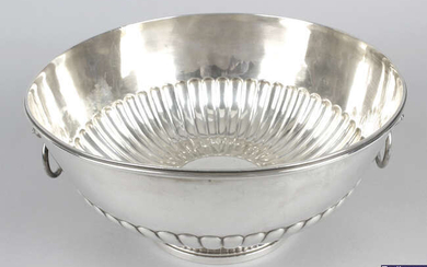 A late Victorian silver punch or rose bowl with twin lion mask handles.
