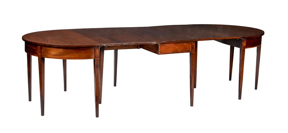A mahogany and crossbanded D-end dining table