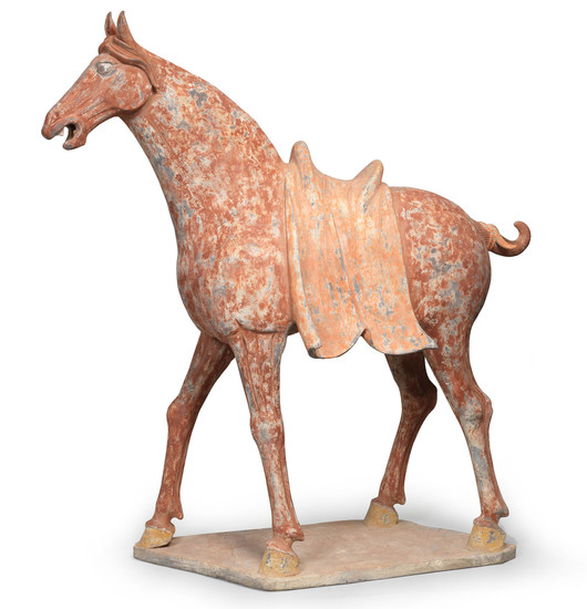 A massive painted pottery model of a horse