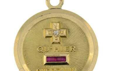 A mid 20th century 18ct gold synthetic ruby and diamond medallion pendant, reading 'Plus qu'hier, moins que demain', by Alphonse Augis.
