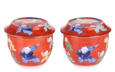A pair of Chinese Famille Verte porcelain tea bowls and cove...