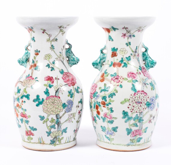 A pair of Chinese famille rose style baluster vases, 20th century, both with flared rims