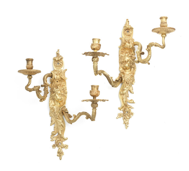 A pair of French gilt bronze twin light wall appliques
