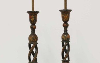 A pair of Indian papier mâché candlesticks