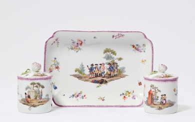 A pair of Meissen porcelain beakers and covers with military scenes
