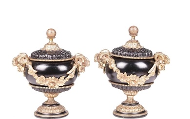 A pair of Neo-classical black lacquer urns and covers, with ...
