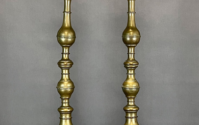 A pair of baroque altar candlesticks. Torches. Brass.