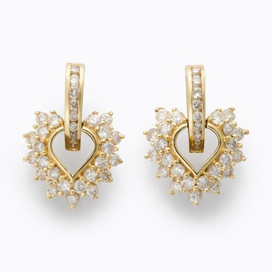 A pair of diamond and fourteen karat gold earrings